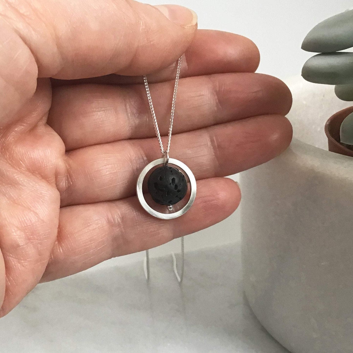 SILVER CIRCLE LAVA STONE DIFFUSER NECKLACE - Genevieve Broughton