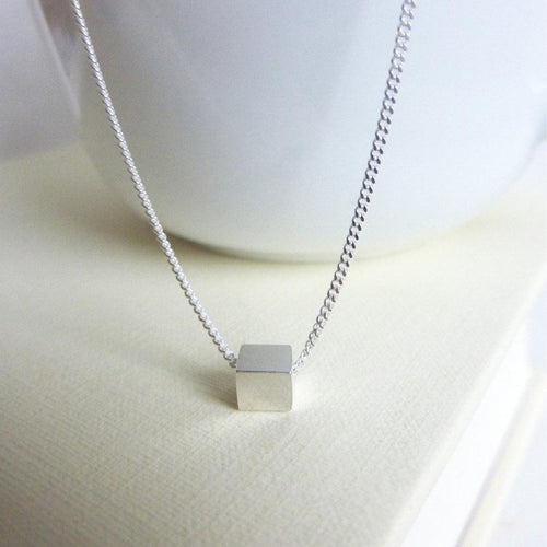 TINY SILVER CUBE NECKLACE - Genevieve Broughton
