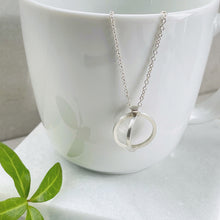 Load image into Gallery viewer, Silver circle eclipse necklace - Genevieve Broughton
