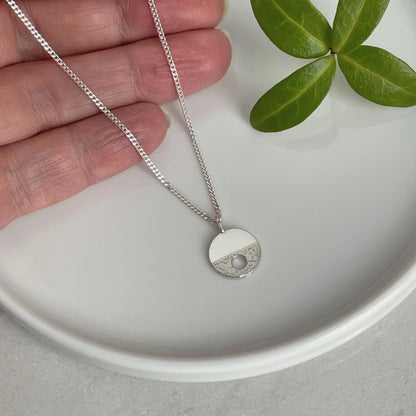 MODERNIST SMALL SILVER CIRCLE HOLE NECKLACE - Genevieve Broughton