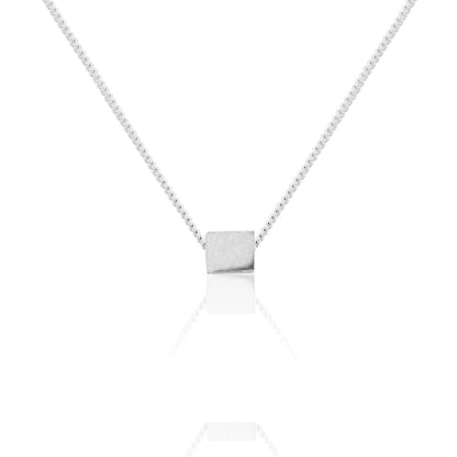 TINY SILVER CUBE NECKLACE - Genevieve Broughton