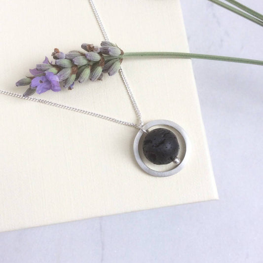 SILVER CIRCLE LAVA STONE DIFFUSER NECKLACE - Genevieve Broughton