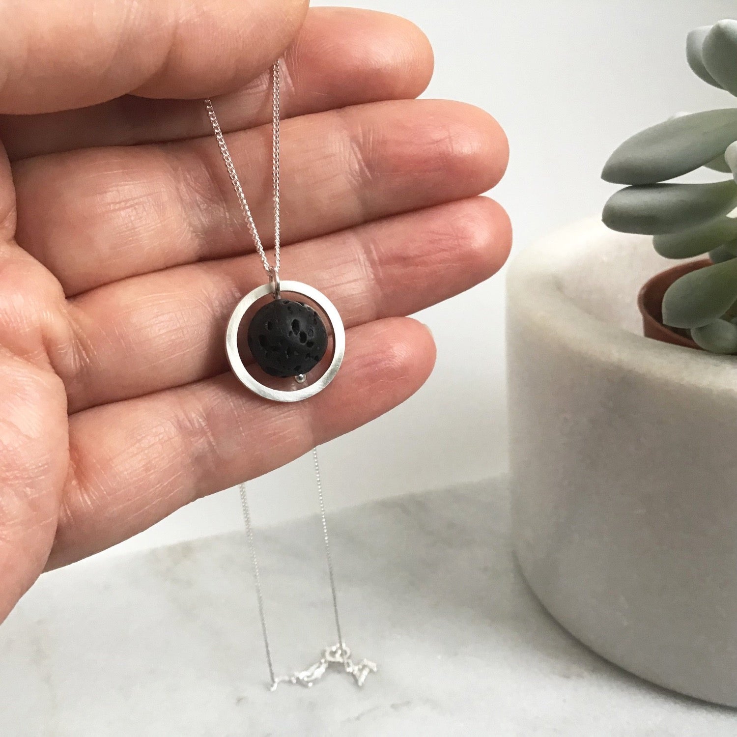 SILVER CIRCLE LAVA STONE DIFFUSER NECKLACE - Genevieve Broughton