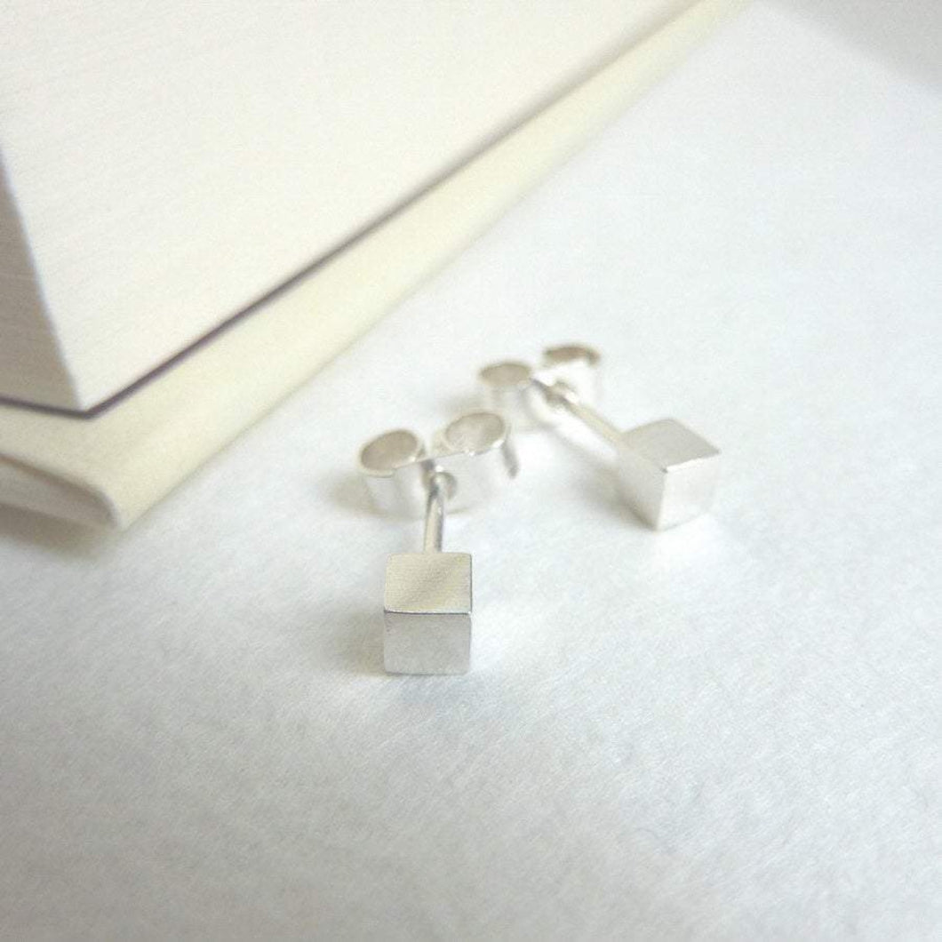 TINY SILVER CUBE STUD EARRING - Genevieve Broughton