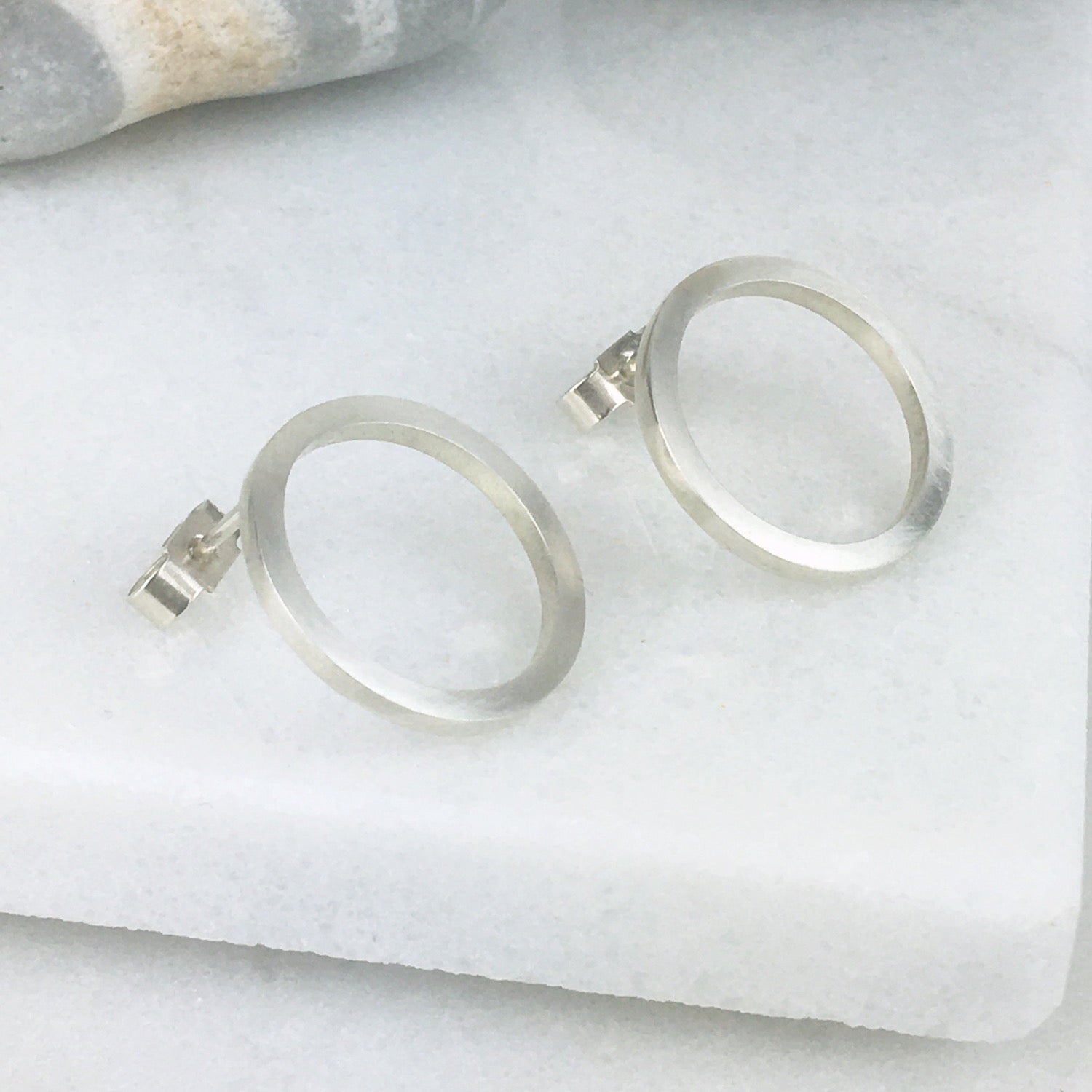 FLAT OPEN CIRCLE SILVER EARRINGS - Genevieve Broughton